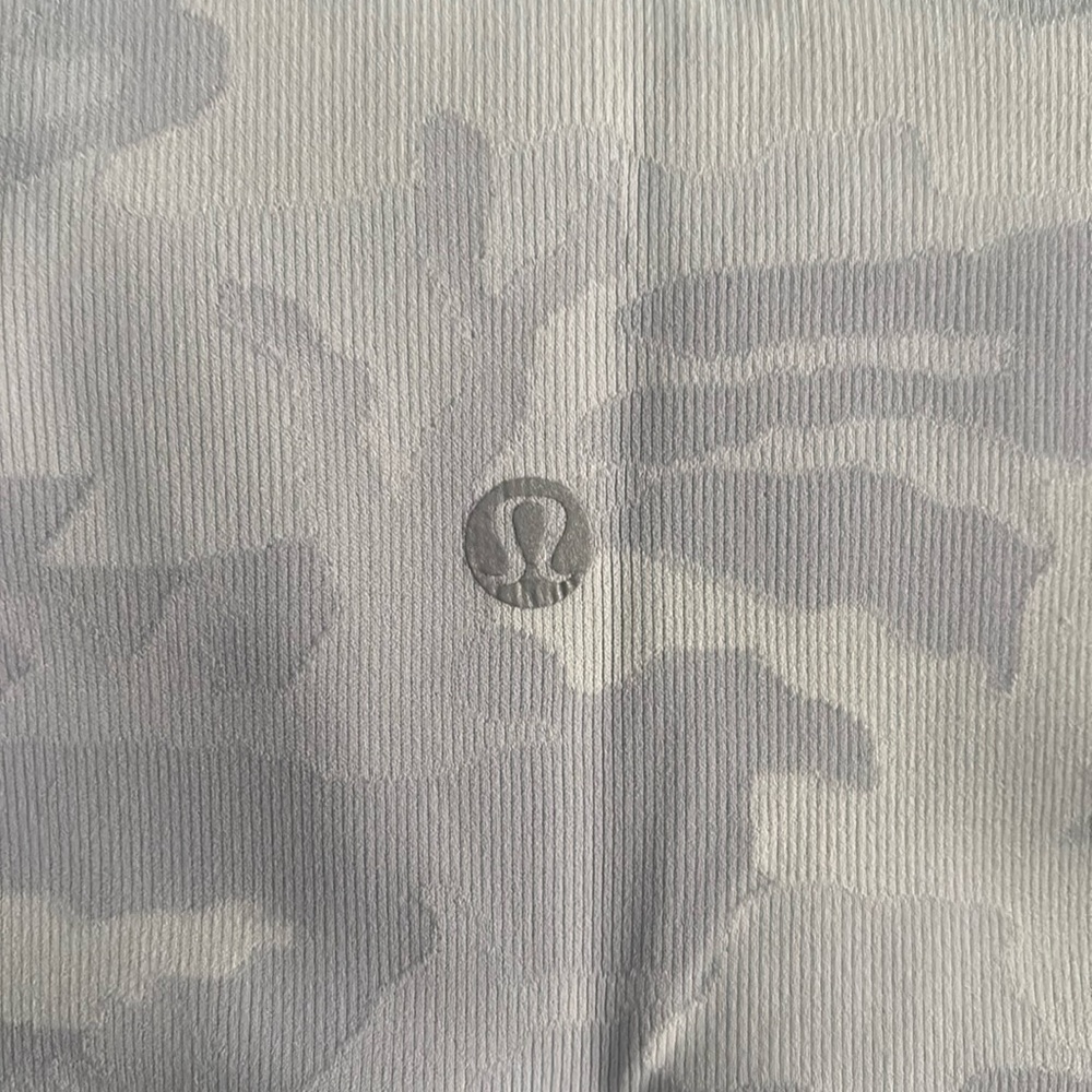 lululemon tights. Worn once, tag is for product info only. A small mark as shown